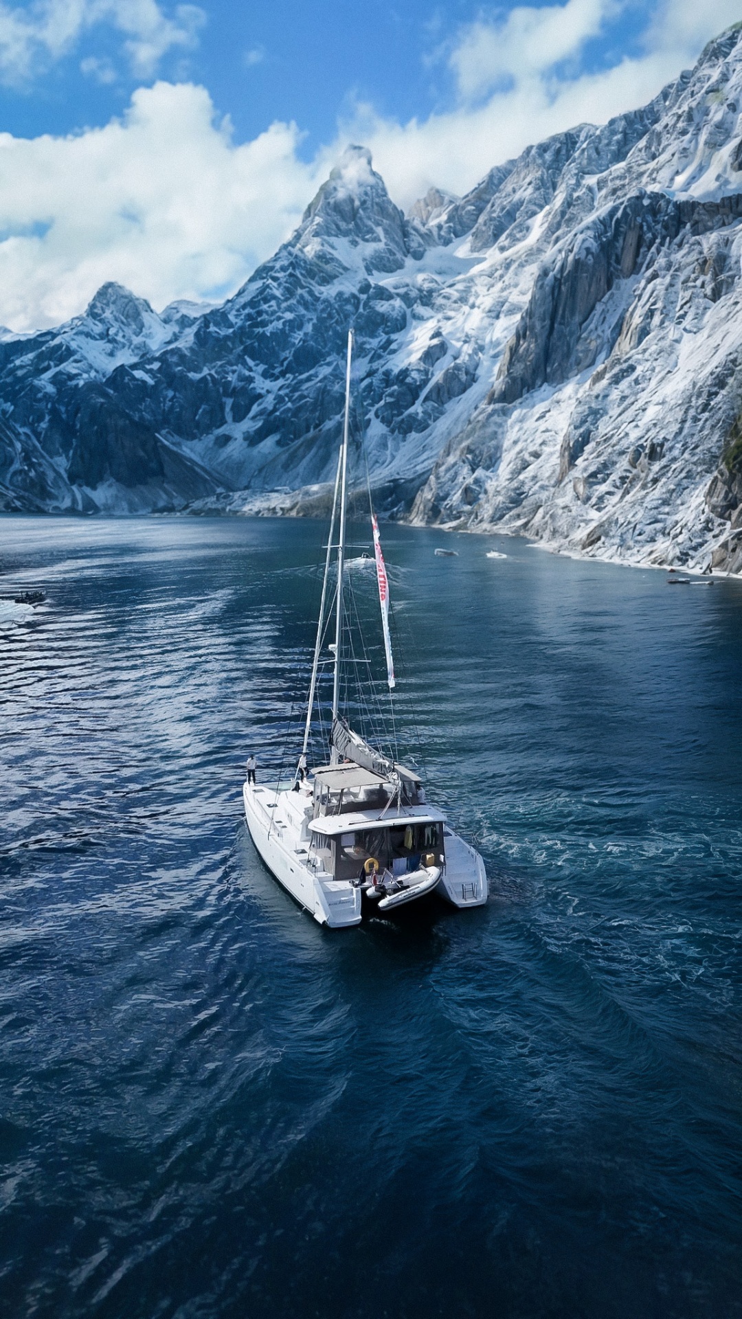 The saloon — panoramic windows over a snowy fjord, soft lighting and sheepskin throws